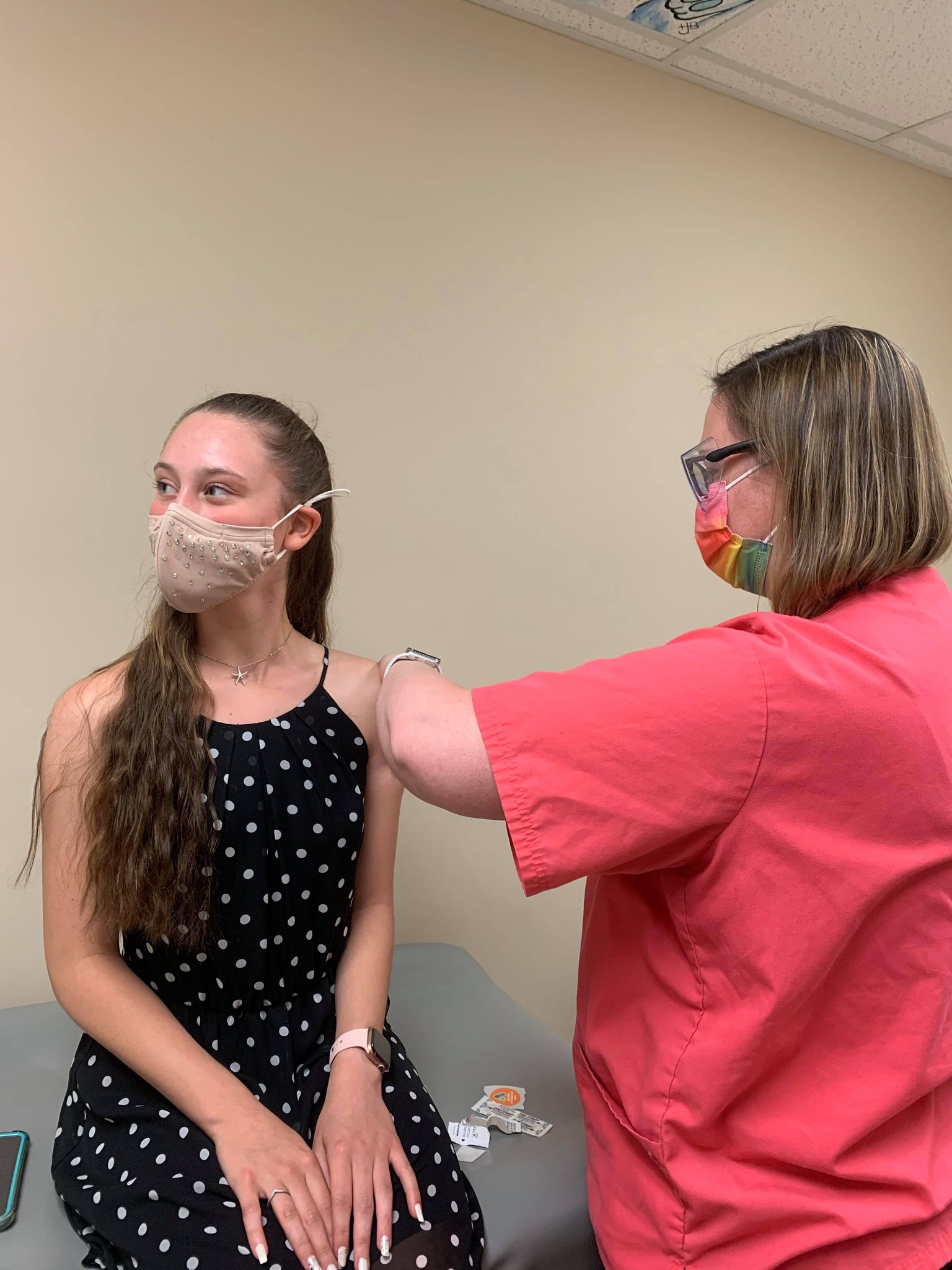 adolescent receiving vaccine 