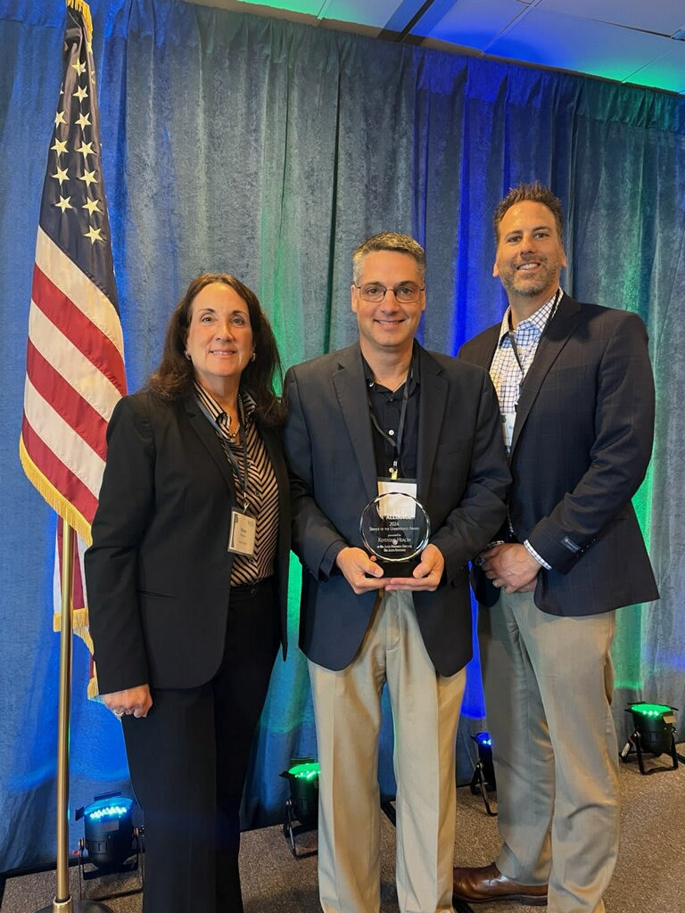 Dave Grant and Dr. Colli receiving award